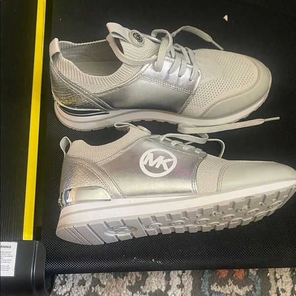 Michael Kors Metallic Silver and White Sneakers - Picture 2 of 3